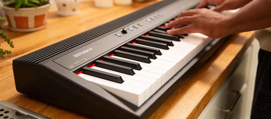 ban phim dan roland go 88p